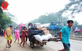 Tiểu thương đập tường giải cứu hàng hóa ở vụ cháy chợ Quang